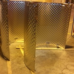 Part of the pre-production cryopump thermal shields that will protect the cryopanels from excessive thermal loads. (Click to view larger version...)