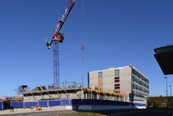 The ''West Wing'' addition to the Headquarters Building will accommodate 350 ITER staff and contractors presently hosted in buildings one kilometre away. (Click to view larger version...)