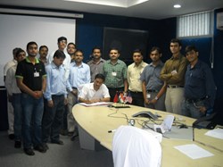 The head of the Indian Domestic Agency, Shishir Deshpande, and his team signing the Procurement Arrangement this week. (Click to view larger version...)