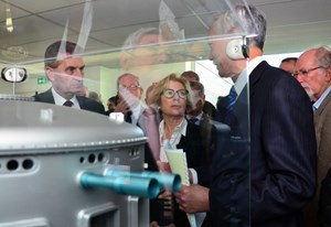 Shortly after their arrival and before meeting the press prior to the inauguration, European Commissioner Oettinger and French Minister Fioraso listen to ITER Director-General Osamu Motojima explain the workings of the ITER Tokamak in front of a 1:50 scale model. (Click to view larger version...)