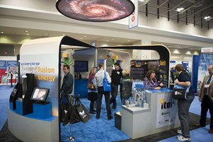 The US ITER exhibit — featuring a rotating ''galaxy,'' new video program, hands-on plasma ''toys,'' and interactive fusion quiz—was lauded as one of the meeting's best. (Click to view larger version...)