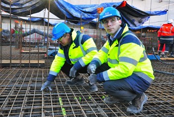 ''Since construction activities began in 2010, F4E has signed contracts worth EUR 900 million for the creation of the ITER scientific facilities,'' says Laurent Schmieder, Site, Buildings and Power Supplies project manager (right) seen here with F4E Director Henrik Bindslev. (Click to view larger version...)
