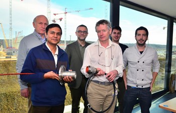 The high-voltage magnet instrumentation team has achieved a critical milestone. From left to right: Adamo Laurenti; Kalpesh Doshi; Arnaud Devred; Jean-Yves Journeaux, Roland Piccin and David Carrillo. (Click to view larger version...)