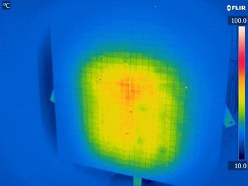 Picture of the ELISE calorimeter recorded by a thermographic camera, which measures the energy content of the particle beams produced. Here, one of the world-record beams displays its glowing signature. © IPP (Click to view larger version...)