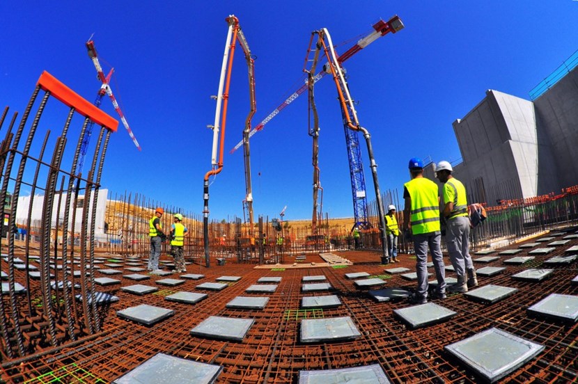 It takes a fisheye lens, which makes the steel reinforcement appear a bit distorted, to take in the whole of the concrete pouring scene for the Tritium Building slab ... (Click to view larger version...)
