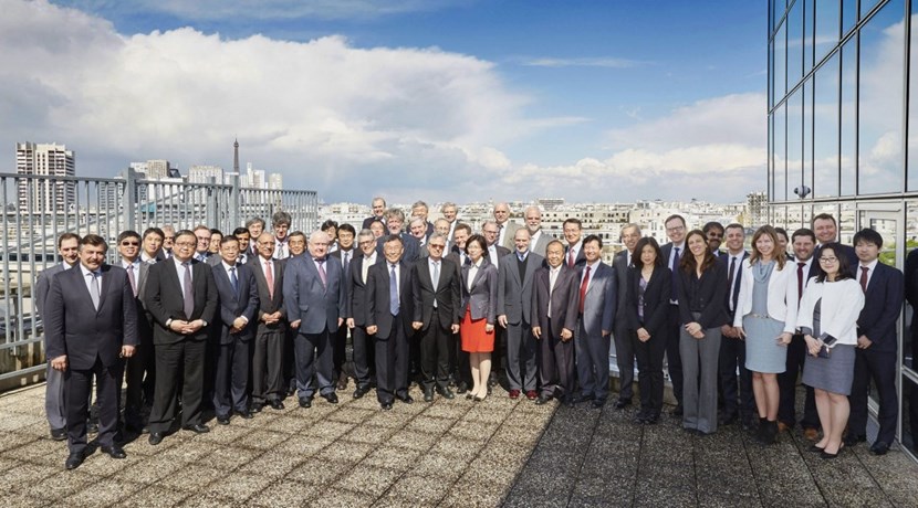 The tip of the Eiffel Tower, to the left, provides an unusual backdrop to the group picture of high-level representatives from the seven ITER Members who met in Paris for an extrordinary ITER Council. Photo Arnaud Calais (Click to view larger version...)