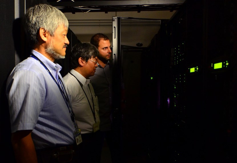 A fruitful collaboration in state-of-art information science and technology. Pictured: Hideya Nakanishi, fusion scientist for computer-aided experiment data systems, National Institute for Fusion Science; Kenjiro Yamanaka, network engineer, National Institute of Informatics; and Thierry Reboul, network administrator, ITER Organization. (Click to view larger version...)