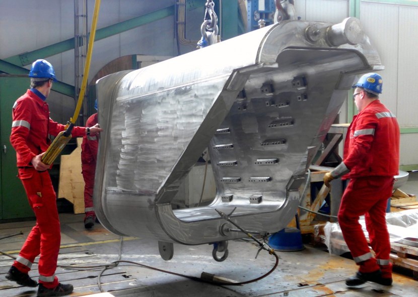 This 20-tonne component will ''fit'' onto upper port #12. Following final machining and testing, it will be shipped to Korea to be welded to vacuum vessel sector 6. (Click to view larger version...)