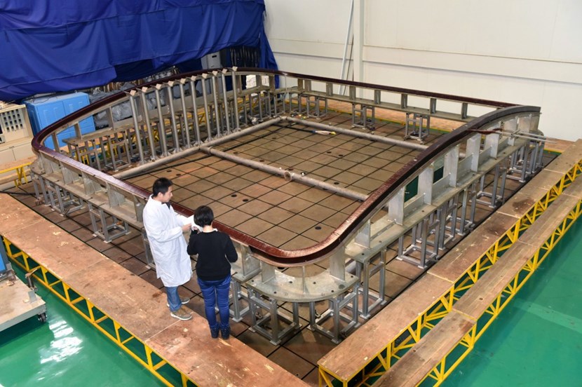 The full-scale dummy side correction coil prototype in this photo was used to qualify winding and impregnation manufacturing steps. At ASIPP in Hefei, a multiyear qualification program has been carried out to ensure that the correction coils can be produced to specification despite unusual shapes and very demanding precision requirements. (Click to view larger version...)