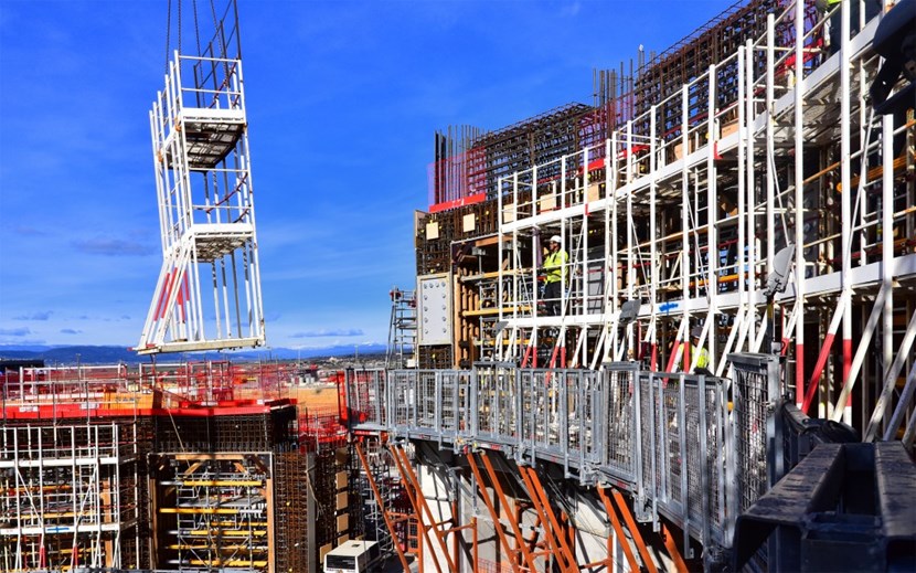 Standing at the L2 level of the bioshield, a worker helps the viewer to judge the scale of the construction work underway at the heart of the Tokamak Building. (Click to view larger version...)