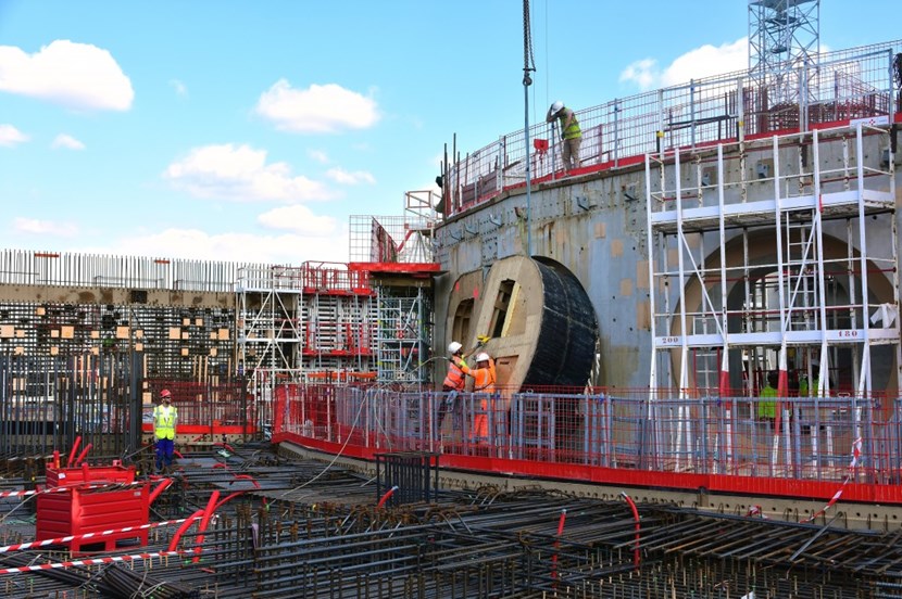 On 6 April, the massive semi-circular formwork was removed— or rather ''gouged out''—of the bioshield wall. (Click to view larger version...)