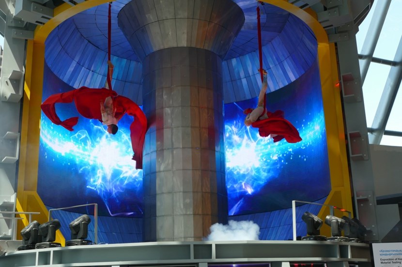 Dancers from the Carros De foc perform in a mockup of the KTM tokamak that figures prominently in the Kazakh pavilion at the Astana World's Fair. www.carrosfoc.com - ''A Brighter Future'' (Click to view larger version...)