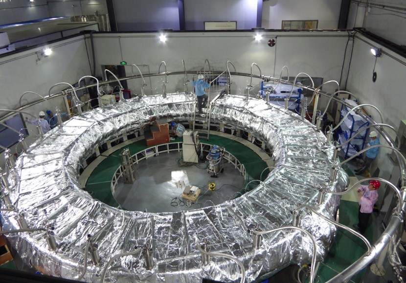 By carrying out all the steps in the process on mockups first, tooling and techniques are confirmed before the work is carried out on actual components. Pictured: the vacuum impregnation of a ''dummy'' double pancake winding at ASIPP. (Click to view larger version...)