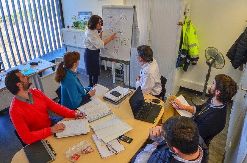 The safety approach at ITER is a ''creative and adaptive process,'' says Joëlle Elbez-Uzan (seen here at the whiteboard during a meeting with her team) who heads the ITER Environmental Protection & Nuclear Safety Division. (Click to view larger version...)