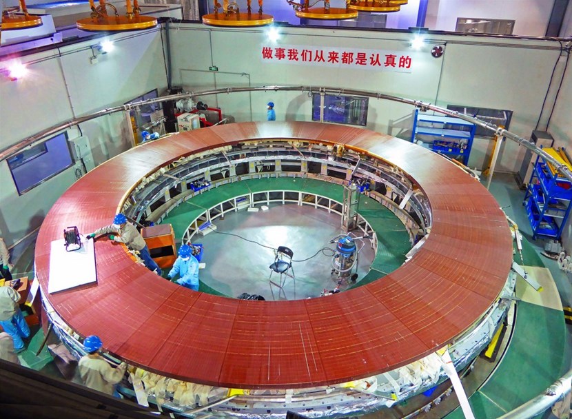 A double pancake for poloidal field coil #6 (PF6) undergoes impregnation at the Institute of Plasma Physics of the Chinese Academy of Sciences (ASIPP) in Hefei, China. (Click to view larger version...)