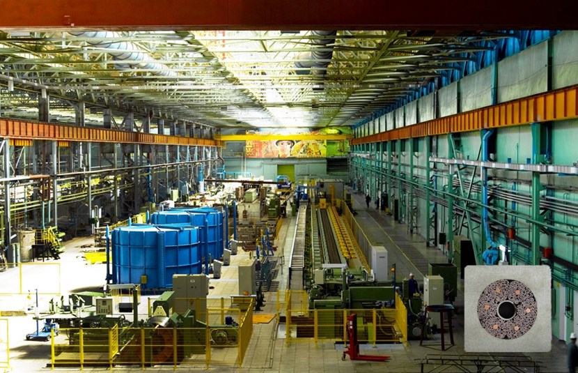A view of the manufacturing workshop at the Chepetsky Mechanical Plant in Glazov, where more than 120 tonnes of niobium-titanium superconducting strands were produced for ITER. In the insert, the braided strands have been compacted around a cooling channel and pulled into a structural jacket. (Click to view larger version...)