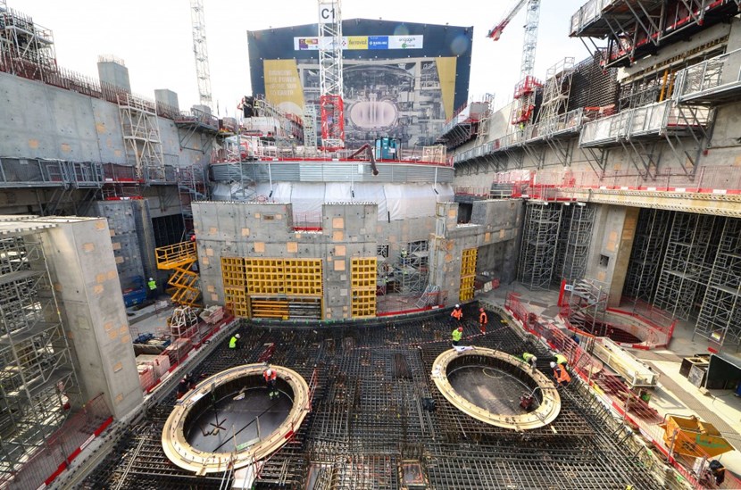 Giant power outlets for a giant appliance. These circular openings in the rebar at L3 level of the Tokamak Building are more than 3 metres in diameter each. They will allow the high-voltage bushings of the neutral beam system to deliver electrical power, cooling, and other services such as diagnostics to the injectors below. (Click to view larger version...)