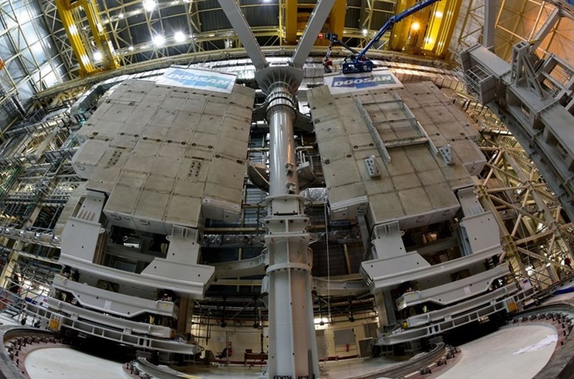 When two 340-tonne test loads were positioned recently on one of the sector sub-assembly tools in the Assembly Hall, the metrology team was there to help the operators align the loads vertical to gravity and within one millimetre. The team has established the Tokamak Complex Global Coordinate network for the alignment of components, as well as a local coordinate system in the Assembly Hall for vacuum vessel sector sub-assembly. (Click to view larger version...)