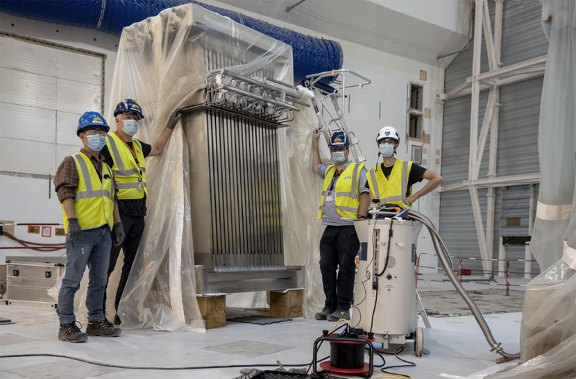 They were tested again last week to ensure that shipping, handling and unpacking operations had not altered their leak tightness. The 2.65-metre-tall supports will be the next components installed in the Tokamak pit. From left to right: Park Young Min, Inspection and Test coordinator; Cornelis Beemsterboer, Magnet Supports Responsible Officer; Jean-Louis Bersier, vacuum engineer; and Yvan Parsis of the ITER vacuum team. (Click to view larger version...)