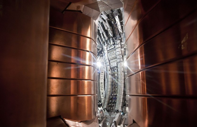 Shot from the inside of the neutral beam injector, this picture shows JET's ''ITER-like'' wall in the background. (© EUROfusion) (Click to view larger version...)