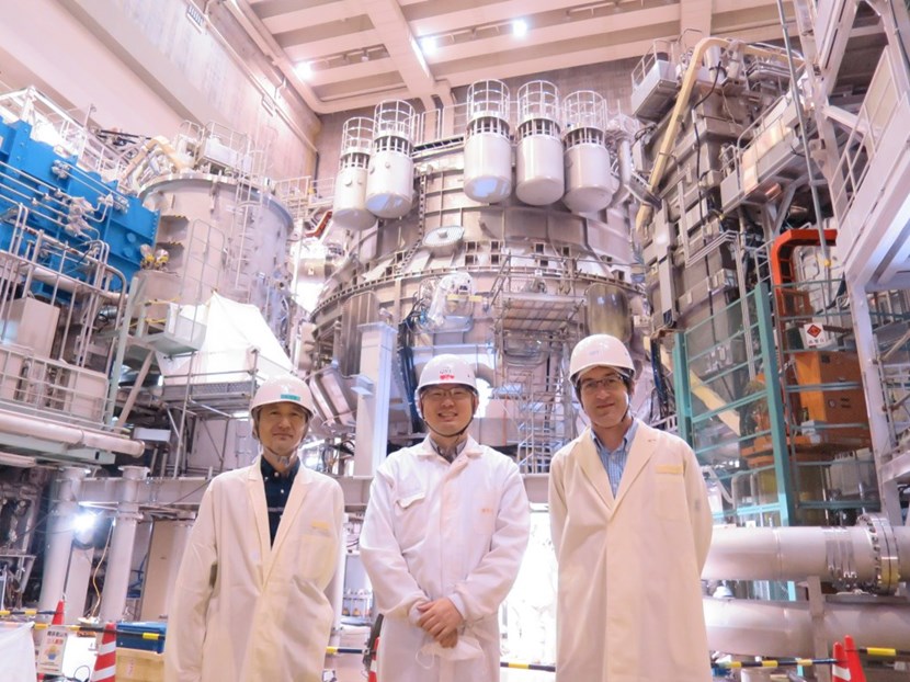 R. Maekawa (ITER, left) participating in integrated commissioning activities with K. Natsume (QST, centre) and S. Davis (Fusion for Energy, right) at the JT-60SA Torus Hall. (Click to view larger version...)