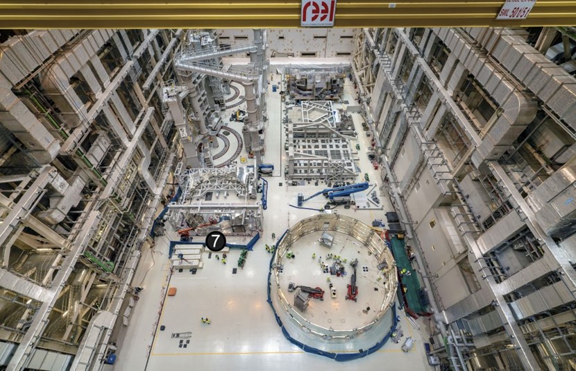 Looking toward the assembly pit. The lower cylinder thermal shield (to the right) is being equipped and prepared for insertion in the pit at the end of the year. (Click to view larger version...)