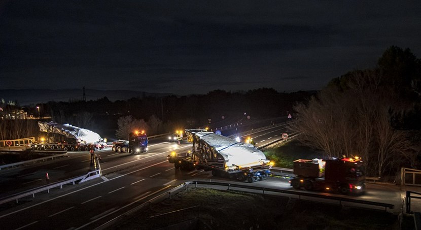 The 50th ITER convoy, transporting the two last segments of the cryostat top lid, is seen here as it crosses the A51 thruway in Provence on the last leg of its journey to the ITER construction site. (Click to view larger version...)