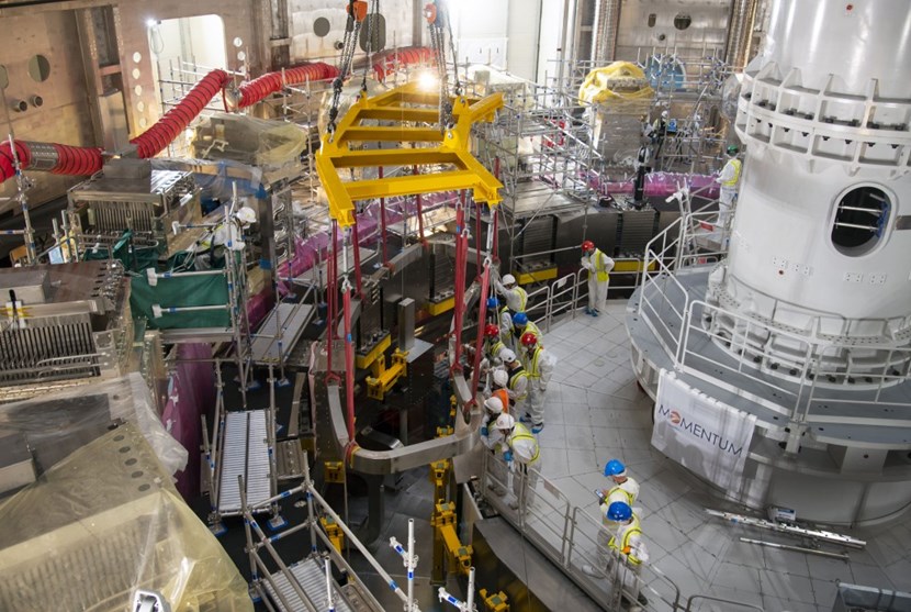 A 4-tonne bottom correction coil is inserted into the Tokamak pit on 21 October 2021. Five others will complete the set at the bottom of the machine. (Click to view larger version...)