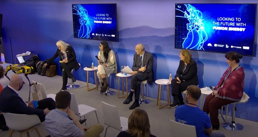 The COP26 panel on ''Looking to the Future with Fusion Energy,'' featuring (L to R): Jane Hotchkiss, Energy for the Common Good; Aneeqa Khan, University of Manchester; Bernard Bigot, ITER; Sibylle Günter, Max Planck Institute for Plasma Physics; Amanda Quadling, UKAEA. Spot the robot dog, created by Boston Dynamics, delivers an iPad with questions from the online audience. (Click to view larger version...)
