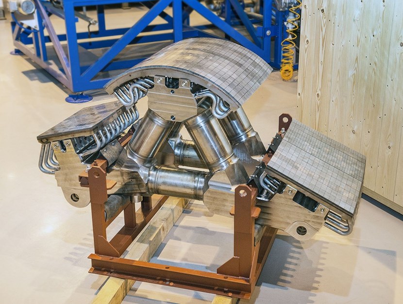 This 1-tonne divertor dome full-scale prototype passed all factory acceptance tests in Russia before shipment, including the stringent hot helium leak test (three heating/pressure cycles (250oC; 4 MPa)). The tungsten tiles developed in Russia have demonstrated thermal resistance under cycling high thermal loads, typically, thousands of cycles at 5 and 10 MW/m². (Click to view larger version...)