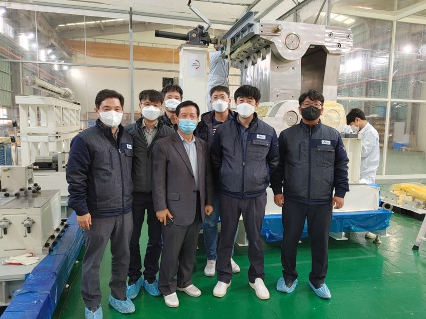 The successful factory acceptance test opens the way for the first unit to be shipped to ITER and for the series manufacturing of the other eight. Pictured, the team at Haneul Engineering in Korea plus ceremony guests, including the Director-General of ITER Korea, Kijung Jung (blue mask). (Click to view larger version...)