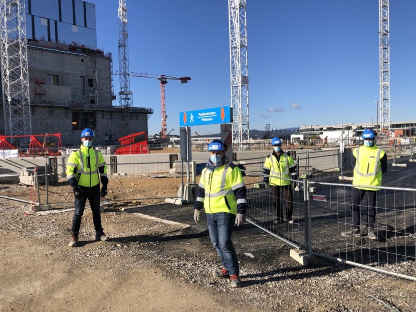 Not just any stretch of road: this new access way on the ITER platform was finalized through the coordination of the outgoing and incoming teams, a symbol of the larger transfer of platform coordination responsibility from Fusion for Energy to ITER. Pictured are Julien Carriere and Didier Labarthe from ENGAGE (left), and Gregory Thibault and Guillaume Merriaux Mansart from MOMENTUM (right). (Click to view larger version...)