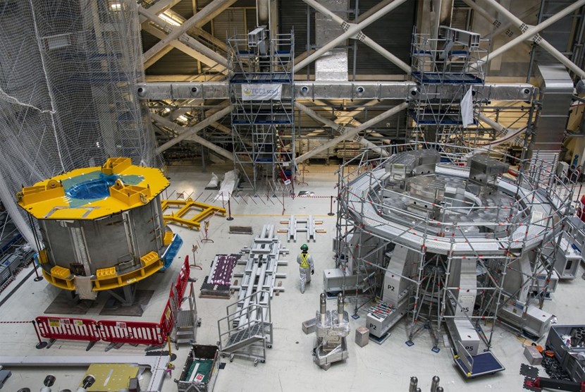 In the ITER Assembly Hall, the temporary table (left) and assembly platform (right) are side by side in the space reserved for the central solenoid assembly. Before the first module can be transferred to the platform, its instrumentation, sensors and superconducting joints must be carefully checked and tested. (Click to view larger version...)