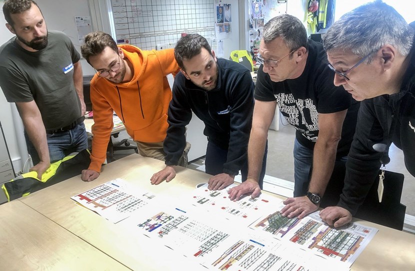 Construction configuration officer and scaffolding contract manager Roberto Mignone gets ''goosebumps'' at the complexity of some of ITER's scaffolding projects. Here he is (far right) with some of the members of the Entrepose Echafaudages team (from left to right Benoît, Maxime, Théophile, and Christophe). (Click to view larger version...)