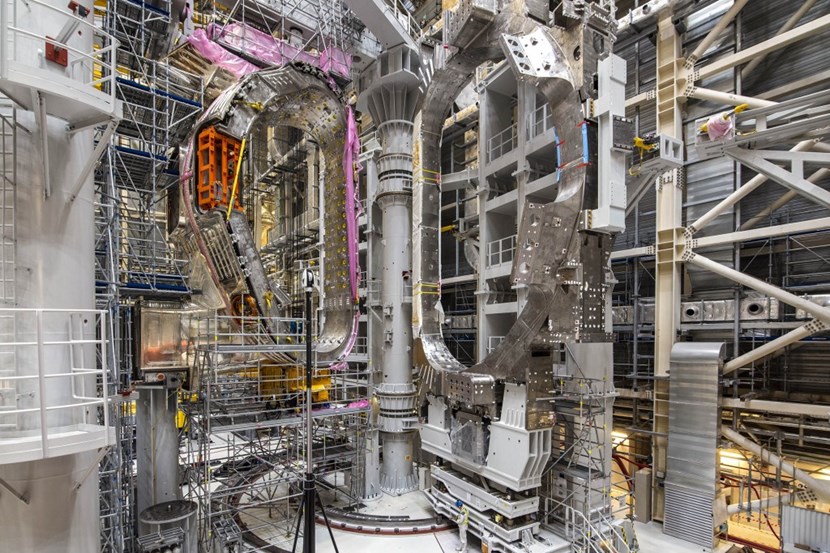 Delivered in April 2020, TF9 from Europe (right) was the first D-shaped magnet to reach the ITER site. Two years later on 25 April 2022, it was attached to the right wing of sector sub-assembly tool #1 (SSAT-1) to be part of the second sector module due for installation in the assembly pit. (Click to view larger version...)