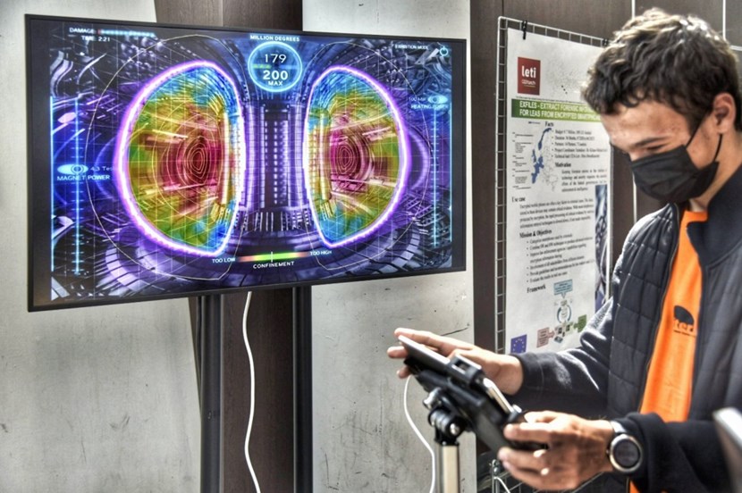 At the ITER stand, students had a chance to learn more about a tokamak through a game app called ''Operation Tokamak.'' The aim is to reach fusion temperatures (up to 200 million degrees Celsius!) by balancing magnetic power and heating power. (Click to view larger version...)