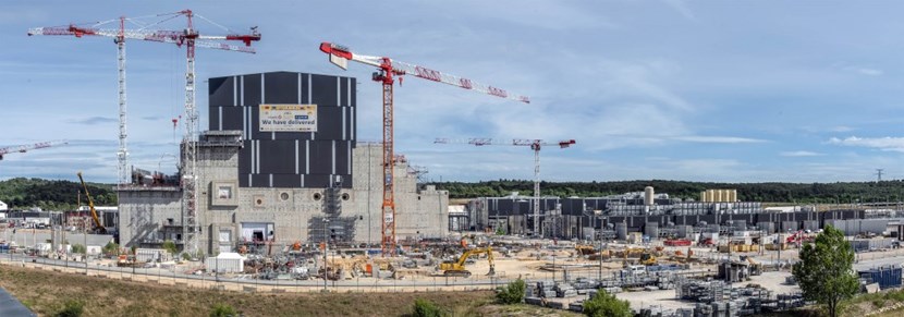 From the roof of ITER Headquarters, the Tokamak Complex stands out as the major feature of the ITER construction site. After a pause while European construction teams concentrated on delivering the Tokamak Building crane gallery (centre), work is proceeding at level L4 of the Tritium Building (located to the left of the Tokamak Building). On the right side of the Complex, behind the red crane, infrastructure for neutral beam power supply is emerging. (Click to view larger version...)