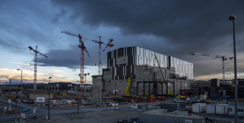 On the right side of the Tokamak Complex, near the yellow telescopic crane, the first of 13 steel frames (15 to 25 metres tall) for the Neutral Beam High Voltage Building were bolted to the concrete slab in early November. Running alongside the Tokamak Complex, the building will extend 84 metres in length and 28 metres in width. (Click to view larger version...)