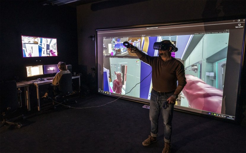 The ITER's Virtual Reality Room gives access to 3D renderings of components and systems which, outside of a few exceptions, are ''as-designed'' and not ''as-built.'' Using today's technologies it is becoming quite simple to scan a complete environment and virtually recreate it as it is in the real world. (In this image, Benoît Manfreo of the Tokamak Integration team, and Chiara Di Paolo, ITER Project Associate in the Tritium Breeding Blanket Section, are exploring the digital mock-up of a port cell inside the Tokamak Building to assess practicability and accessibility for operators working in ventilated suits. (Click to view larger version...)