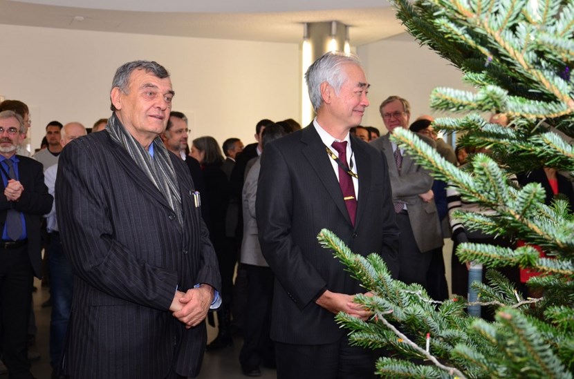 In 2012 Mayor Pizot, here with ITER Director-General Osamu Motojima (2010-2015), initiated a tradition—the gift of a large Christmas tree ever year to symbolize the family-like relationship between ITER and the local community. (Click to view larger version...)