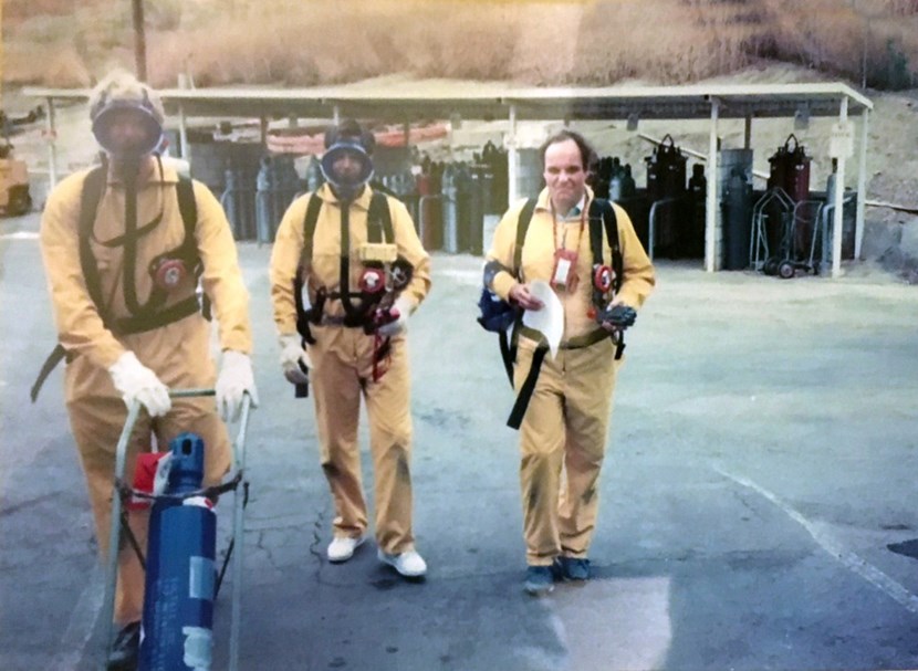 Boronization is now routine. Here, a 1991 photo of Prof. Winter (right) and colleagues ready for the final rehearsal prior to the first boronization of the US tokamak DIII-D. The implementation of diborane gas as a ''vehicle'' for boron explains the protective gear. (Click to view larger version...)