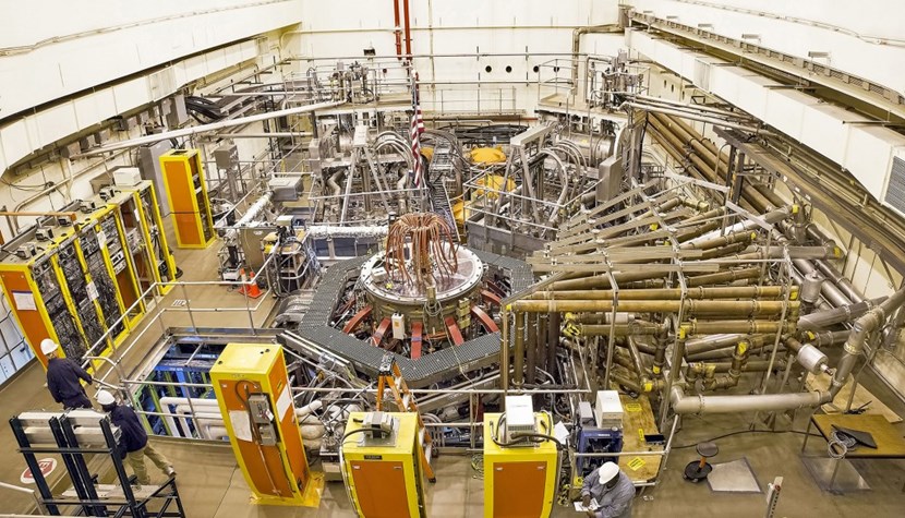 PPPL's National Spherical Torus Experiment-Upgrade (NSTX-U) is shaped more like a cored apple than the doughnut-like shape of more widely used conventional tokamaks. The compact design of the spherical tokamak allows it to produce the essential plasma conditions for fusion energy — the same energy that drives the sun and stars — with relatively low and cost-effective magnetic fields. This economical design makes the NSTX-U a strong candidate to serve as the model for a fusion pilot plant. Credit: Elle Starkman / PPPL Office of Communications (Click to view larger version...)