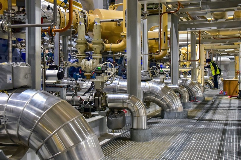 A total of 18 megawatt-class helium compressors, arranged in ''trains'' of six, bring gaseous helium to a pressure of approximately 21 bars and deliver it to the cold boxes. The considerable amount of heat generated by the process is recovered and used to keep the main facilities on the ITER platform at room temperature during the cold season. (Click to view larger version...)