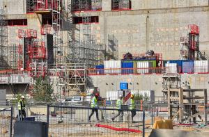 Boomtown_11_workers_walk_small.jpg