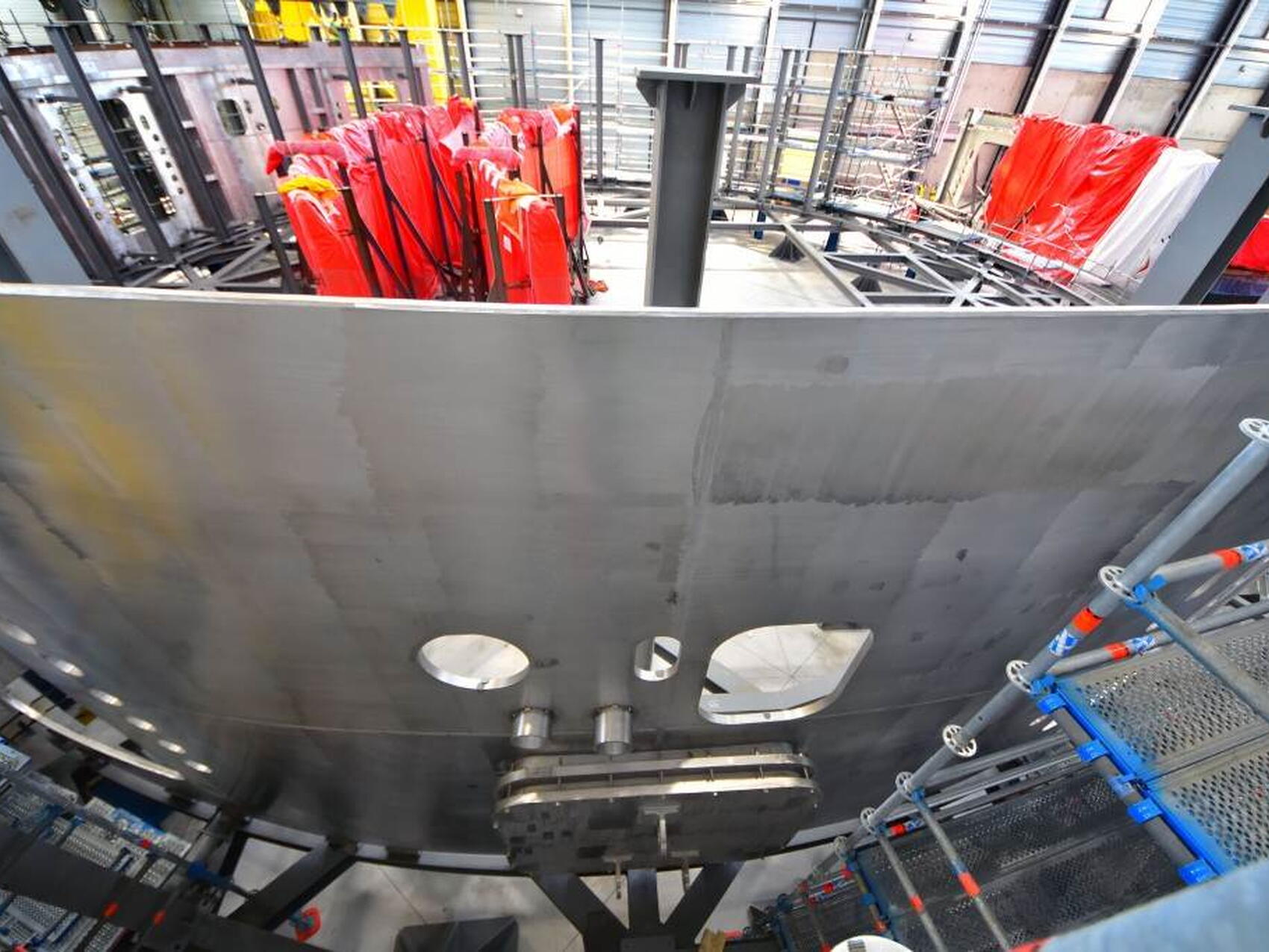 A manhole in a thin wall