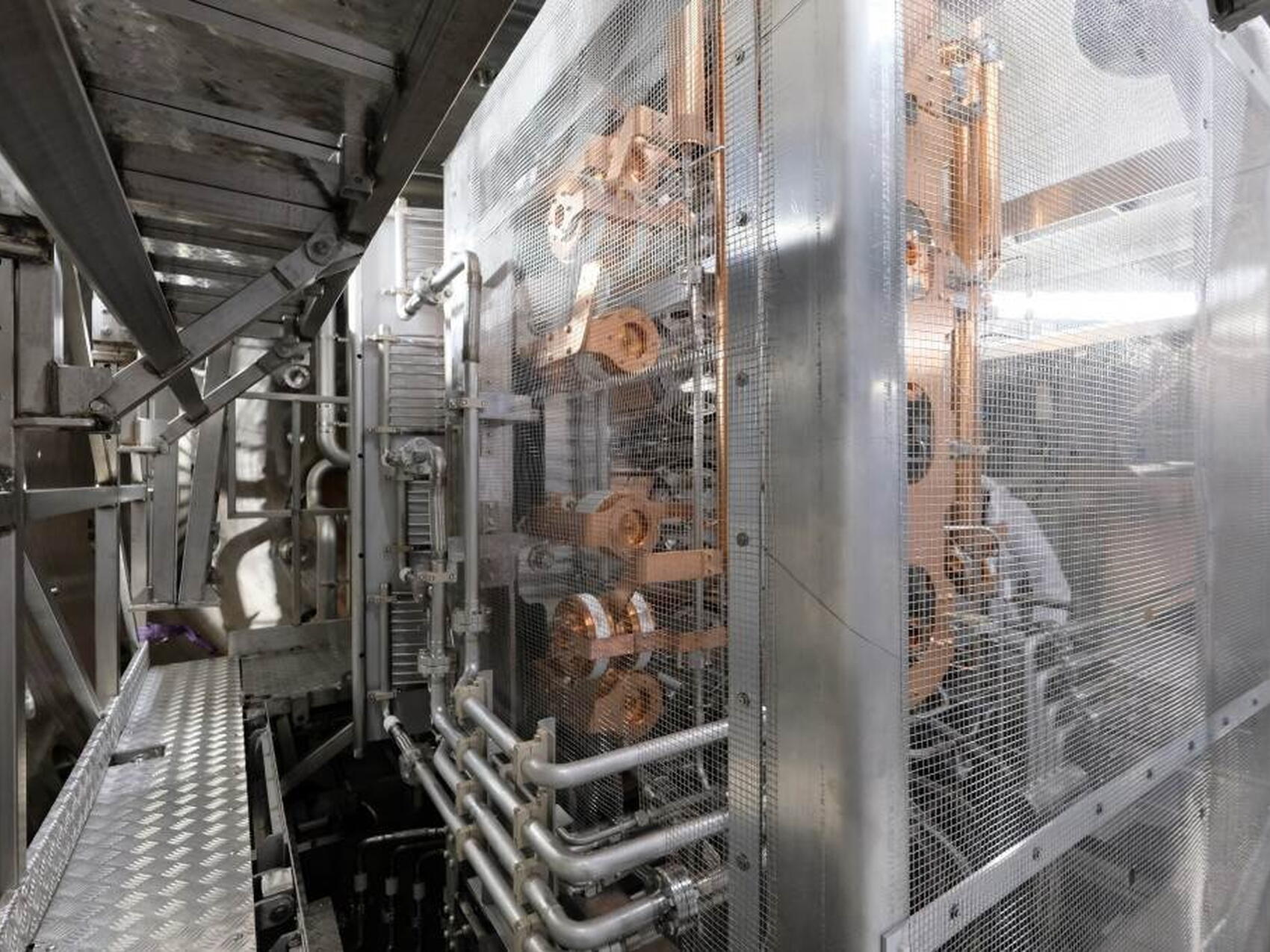 In a see-through cage