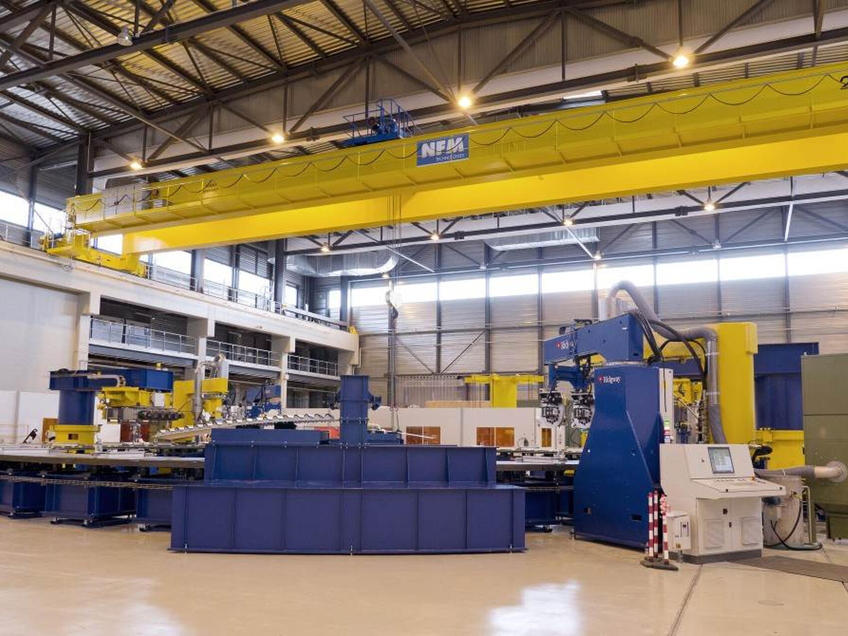 De zone en zone par pont roulant