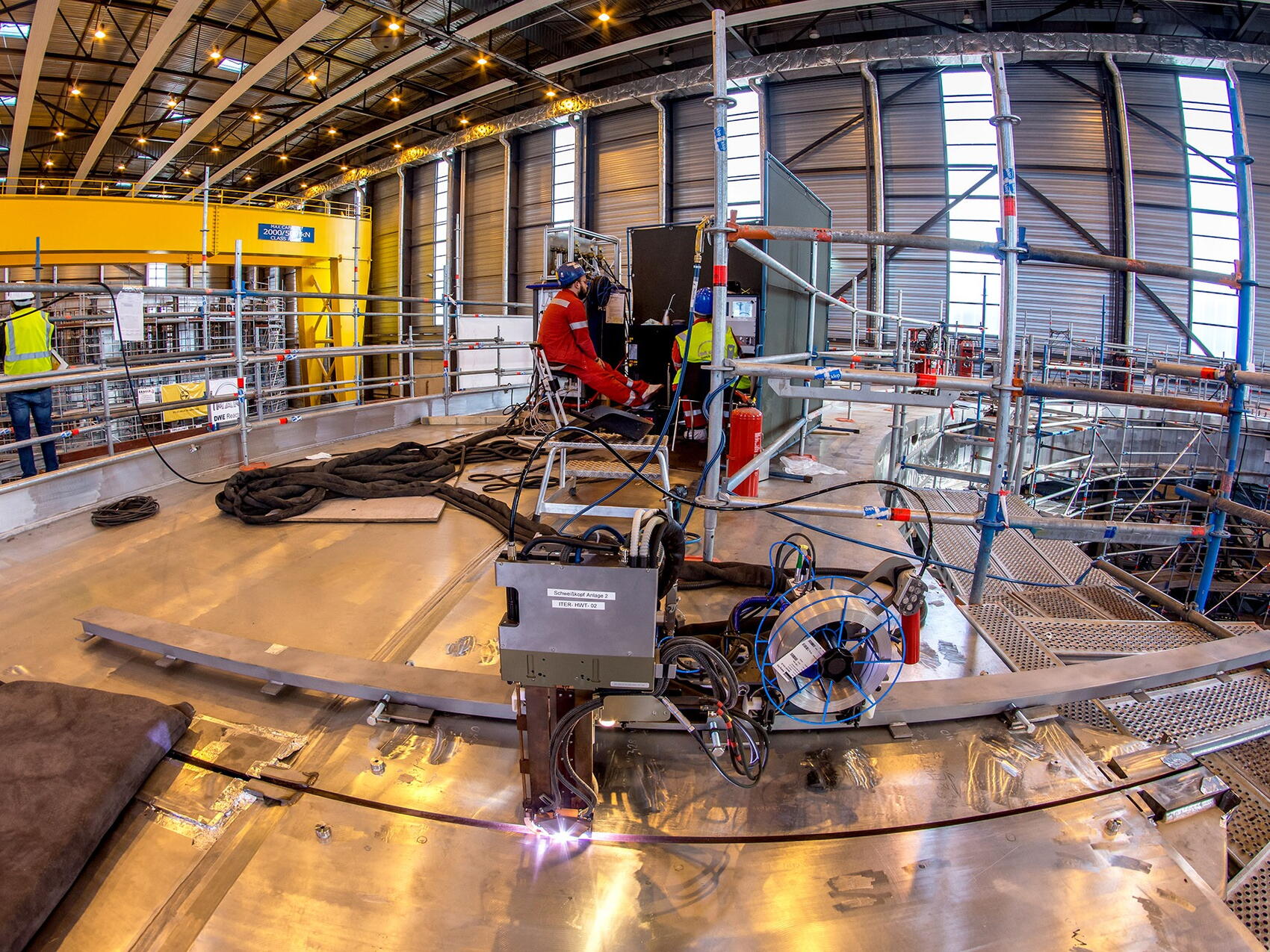 A welding robot on the Tokamak seat